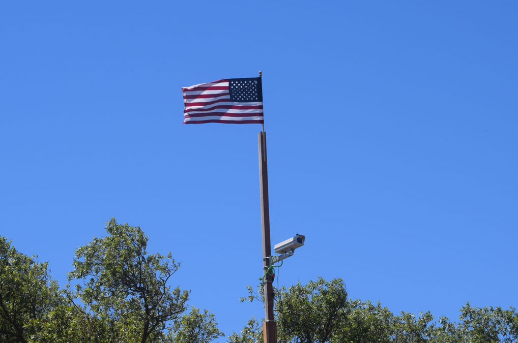 Flag Flies Over Victory Station Camera